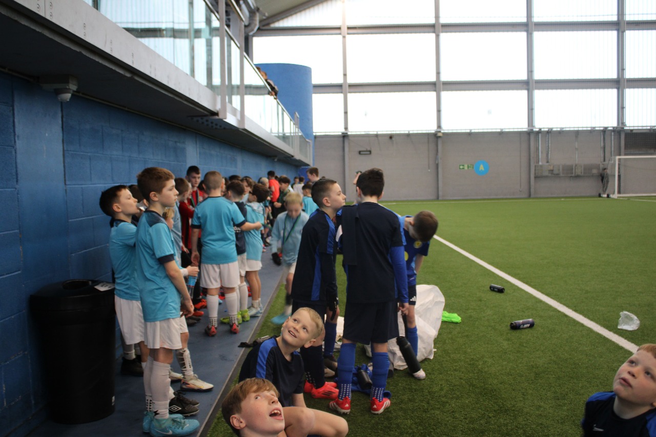 Kids enjoying a football match